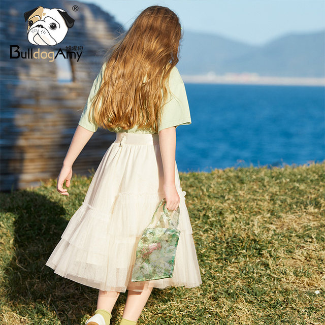ເຄື່ອງນຸ່ງເດັກນ້ອຍ Xiangying ເດັກຍິງສີຂາວຕາຫນ່າງ skirt Princess skirt 2024 ພາກຮຽນ spring ຄົນອັບເດດ: ໃຫມ່ແບບເດັກນ້ອຍ skirt ເດັກຍິງພຽງເລັກນ້ອຍ