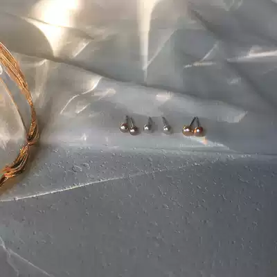 Value-added feedback mini steamed bun-shaped strong light natural freshwater pearl earrings sterling silver simple ear bone nail earrings