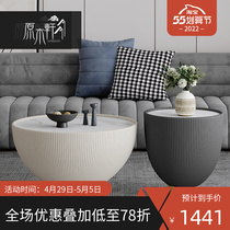 Small family light extravagant advanced round tea table designer creative modern minimalist living-room rock plate high-dwarf tea table composition