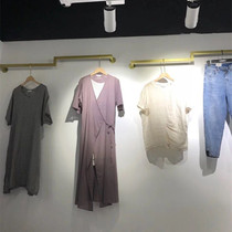 Clothing store display rack on the wall is hanging gold hanging clothes rack wall-mounted clothes rack mens and womens clothing store decoration shelves