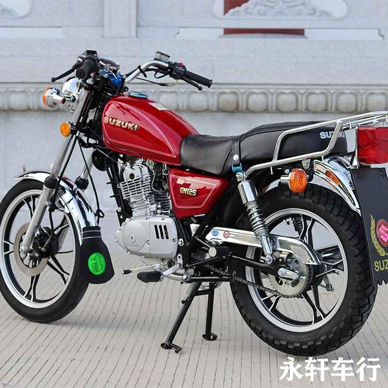 Мотоцикл Suzuki Prince 125 см³ — б/у оригинал, полный комплект, внедорожный, сидение верхом, красный/чёрный