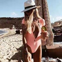 2019 Cross - border new swimsuit Deep V - capacital disclosure of a ladys integrated short - sleeved pure color swimsuit