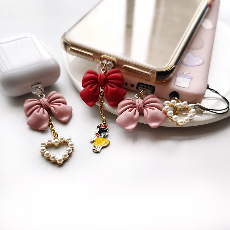 Original fugitive princess butterfly knot mobile phone headphone hole universal dust stopper apple Android data mouth pendant pendant
