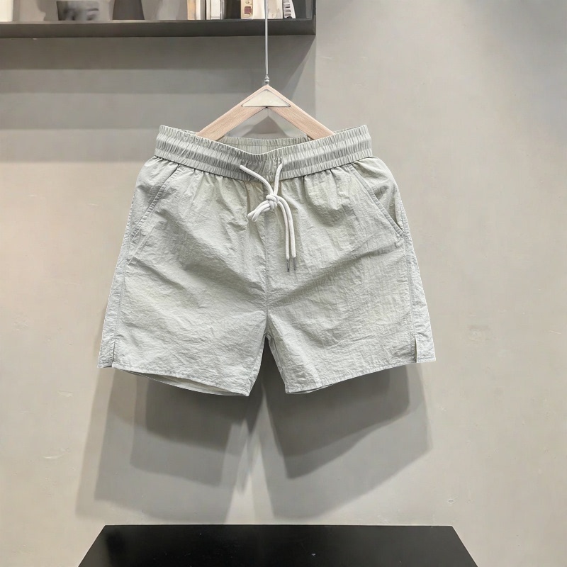 2025 Summer Thin Ice Silk Quick-Dry Casual Shorts Men's Solid Color Simple Youth Quarter Pants Sports Large Shorts