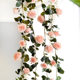 Simulated rose vine ເຄື່ອງປັບອາກາດທໍ່ສະກັດກັ້ນການຕົກແຕ່ງ vine plastic fake vine string flower ເພດານຫໍ່ດ້ວຍຫວາຍດອກໄມ້ປອມ