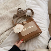 Коричневый с хаки -бочкой сумкой