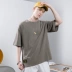 KM Men 2019 Mùa hè Mới Hàn Quốc Loose Half Tops In màu rắn Đường phố Áo thun nam ngắn tay - Áo phông dài