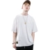 KM Men 2019 Mùa hè Mới Hàn Quốc Loose Half Tops In màu rắn Đường phố Áo thun nam ngắn tay - Áo phông dài Áo phông dài
