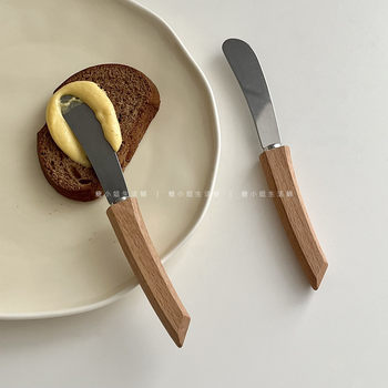 Stainless steel bread and butter spread knife with solid wood handle