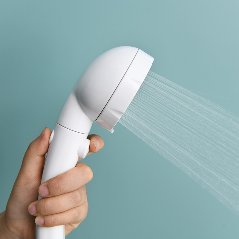 Japan sp three-blocking booster shower head 360 ° rotating shower head water saving pressurized spray head holding a switch lotus shower head