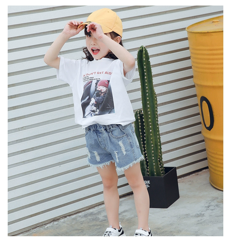 Quần short denim trẻ em mặc mèo đầu thêu mùa hè nóng quần ở trẻ em phần mỏng lỗ bông cô gái lỏng lẻo quần