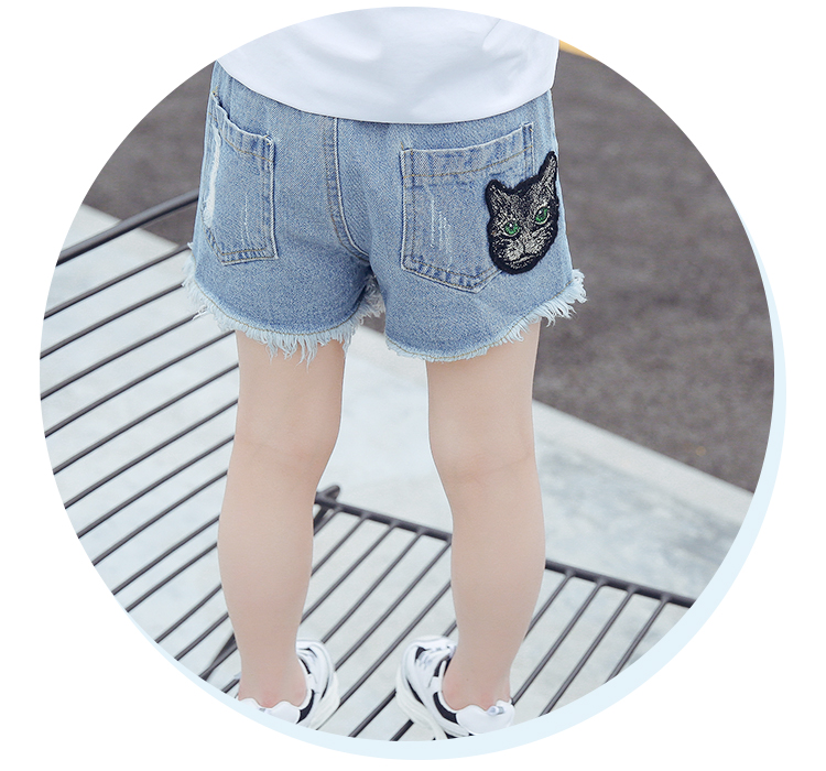 Quần short denim trẻ em mặc mèo đầu thêu mùa hè nóng quần ở trẻ em phần mỏng lỗ bông cô gái lỏng lẻo quần