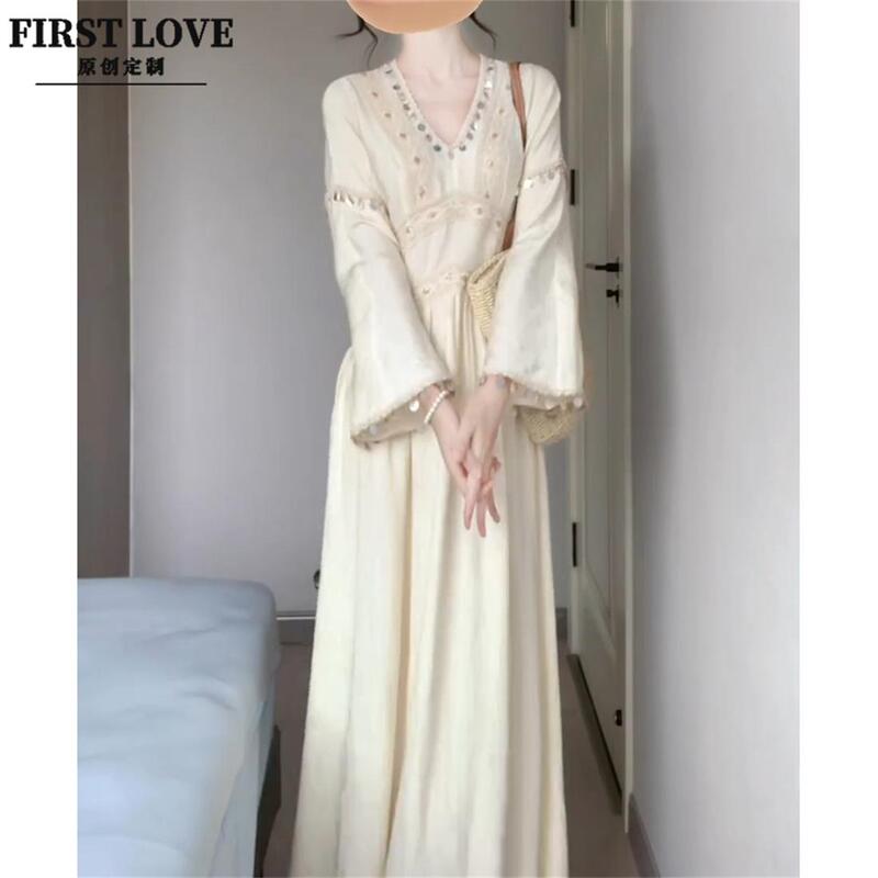 Ethnic Style Heavy Industry Apricot V Neck Dress Women's Autum New National Style Elegant Bell Sleeves Large Hem Skirt Ethnic Style Heavy Industry Apricot V Neck Dress Women's Autum New National Style Elegant Bell Sleeves Large Hem Skirt