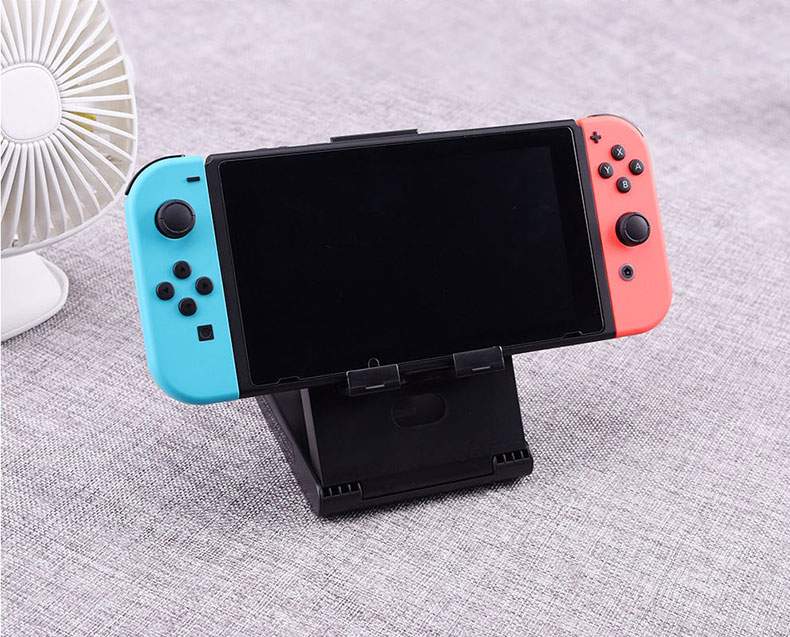 Nintendo chuyển đổi khung cơ sở lười biếng xử lý khung hỗ trợ giường ngủ giường sạc cơ sở làm mát máy chủ NS - PS kết hợp dây sạc pisen