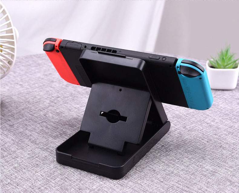 Nintendo chuyển đổi khung cơ sở lười biếng xử lý khung hỗ trợ giường ngủ giường sạc cơ sở làm mát máy chủ NS - PS kết hợp cáp sạc ipad