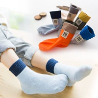 Nốt ruồi cho trẻ sơ sinh bằng cotton vào mùa thu và mùa đông ở bé trai lớn trong vớ 1-3-5-7-9 tuổi giày tất cho bé