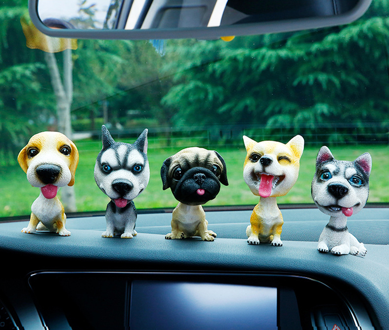 Car decoration creative net red doll shaking head ornaments Car interior products Cute expression charter car interior decoration supplies