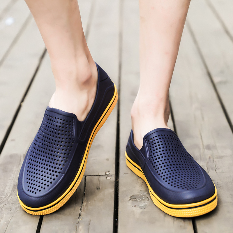 Dép nam lỗ đen thời trang mùa hè mang dép La Mã đôi sử dụng giày dép nam trượt đất chống trượt sandal nam