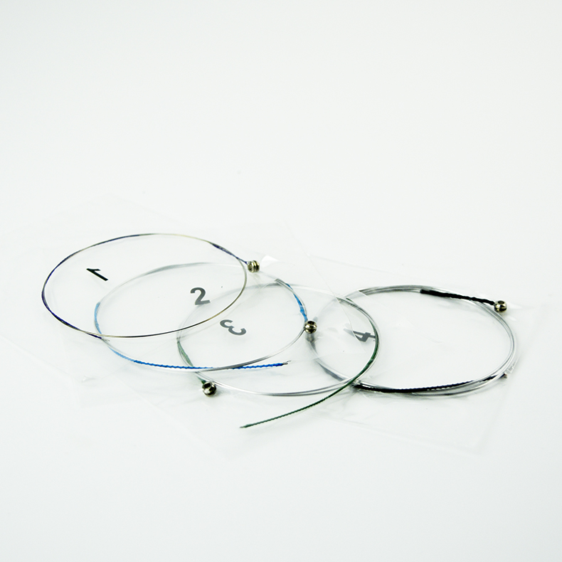 A small tickstring QB026 alloy winding the strings of a set of four