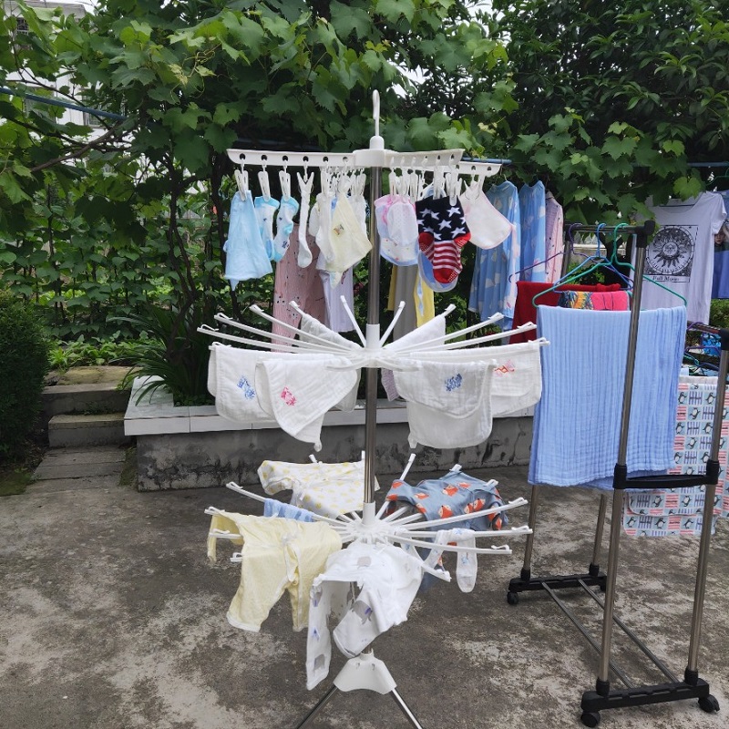 Baby clothes rack Floor folding balcony Stainless steel drying artifact Children's towel rack Baby rotating diaper rack