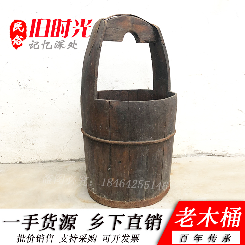 Old wooden bucket wooden bucket in the 1980s folk nostalgia old objects farmhouse pale garbage trash bin old farmware