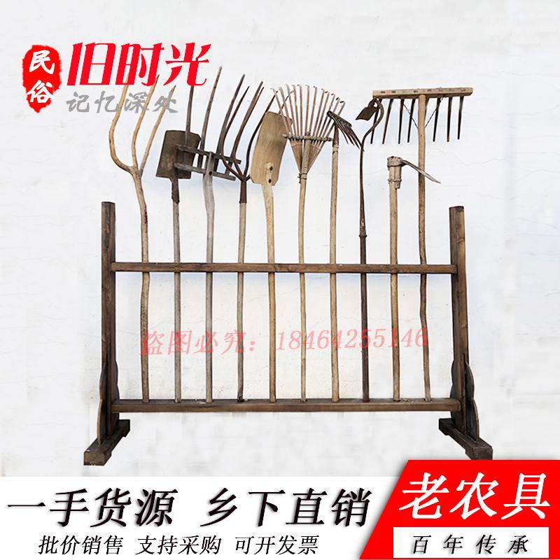 Nostalgic old objects Old farm tools Farming tools Old wooden forks Old wooden rake hoes Pickaxe farm yard decoration ornaments