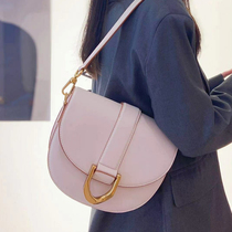 Small ck saddle bag female messenger 2021 early spring new fashion horseshoe buckle armpit bag semicircular milk tea color shoulder bag