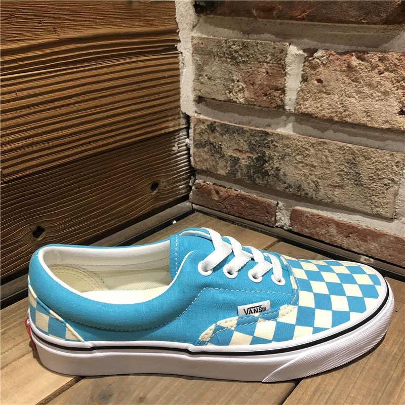 Spot Vans Checkerboard Era màu xanh da trời thấp nam và giày nữ giày vải VN0A38FRVOT - Plimsolls