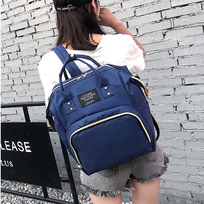Simple and fashionable light riding backpack mommy bag new female blue multi-functional large-capacity travel mother and baby backpack