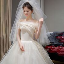 One-shouldered French light wedding dress new 2021 simple Korean pleated travel photo welcome yarn super fairy dream
