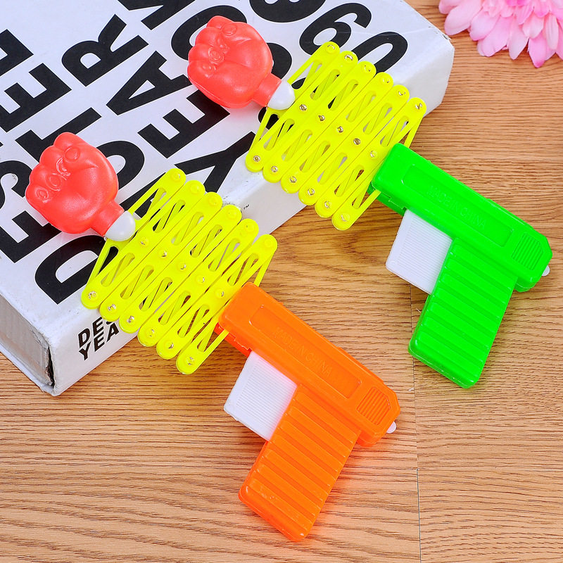 Elastic retractable fist gun 80's childhood nostalgic classic children's toy creative whole person funny magic small gift