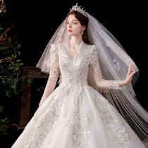 Long sleeve fasting wedding dress 2022 new bridal main wedding gowedding palace windy palace wind small towtail high level sensational summer daughter