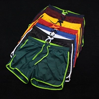 Quần short nam mùa hè mỏng phần viền màu và quần nhanh đi biển thông thường Quần short nam quần thể thao ngoài trời chạy 4 quần quần âu