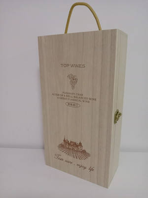 Two bottles of red wine in a wooden box. The box is empty and contains no red wine