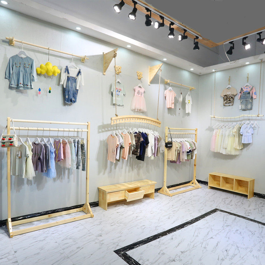 Children's clothing store special display rack hanger Solid wood island rack Women's store floor-to-ceiling shelf display rack decoration