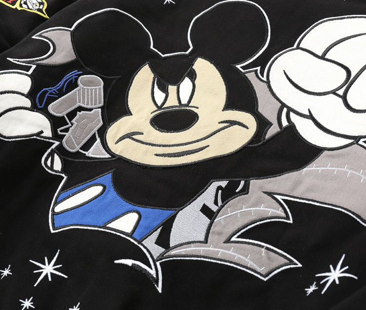 Black baseball jacket in casual setting