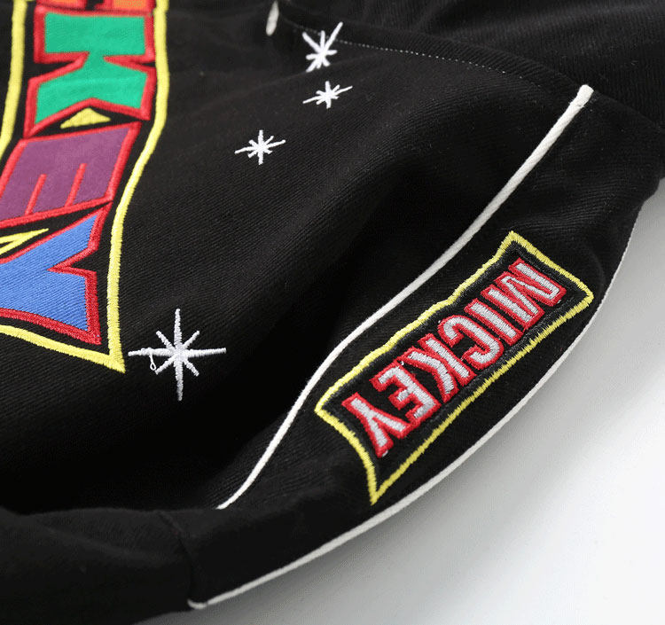 Black baseball jacket detail view