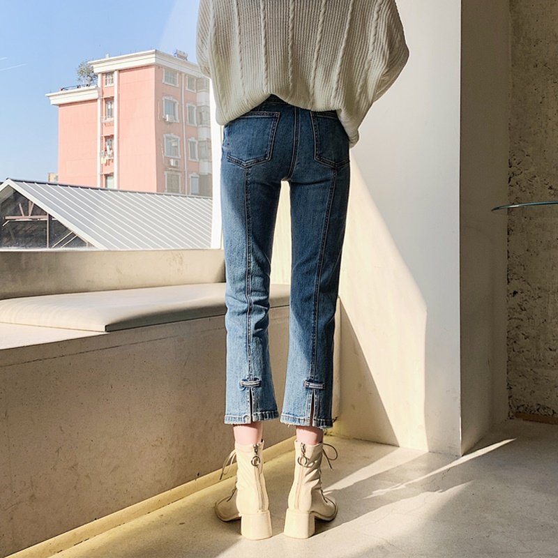 The counter mall withdrew the international big-name cut label surplus single-tail single jeans women's split cigarette pipe nine-point pants spring and summer