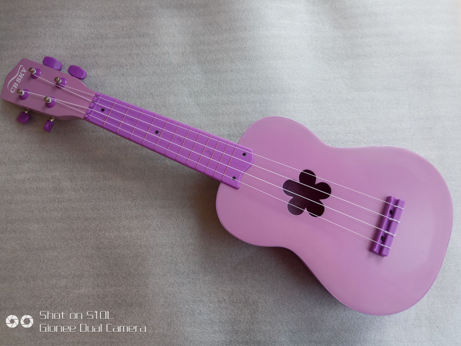 Original single children's 4-string wooden ukulele early education musical instrument can play toy guitar purple plum