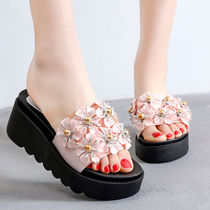 New slippers female summer wear Korean version of the trend students thick bottom slope with fashion flowers
