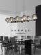 Italian Minimalist Design Restaurant Chandelier Designer 2025 New Glass High-End Dining Table Island Magic Bean Lighting Fixtures