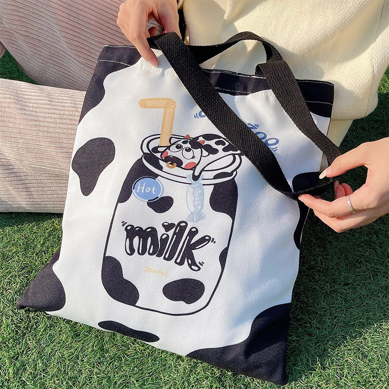 Cow Japanese one-shoulder canvas bag ins large-capacity student cute zipper cloth bag female bag cartoon tote bag - Taobao