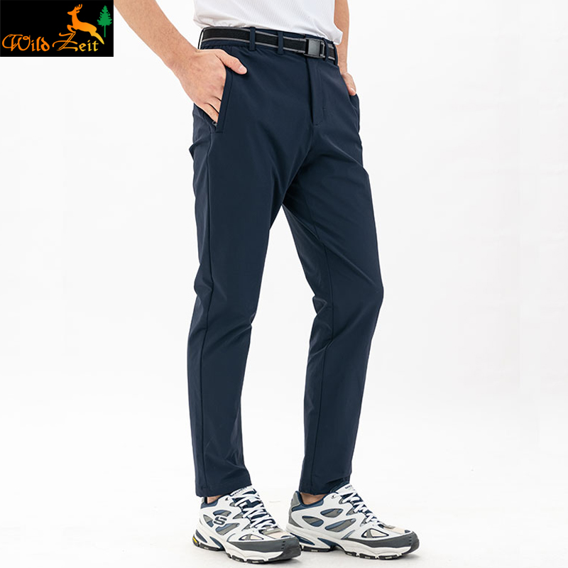 Outdoor quick-drying pants men's and women's spring and autumn loose sports storm pants men's hiking stretch breathable hiking pants long pants