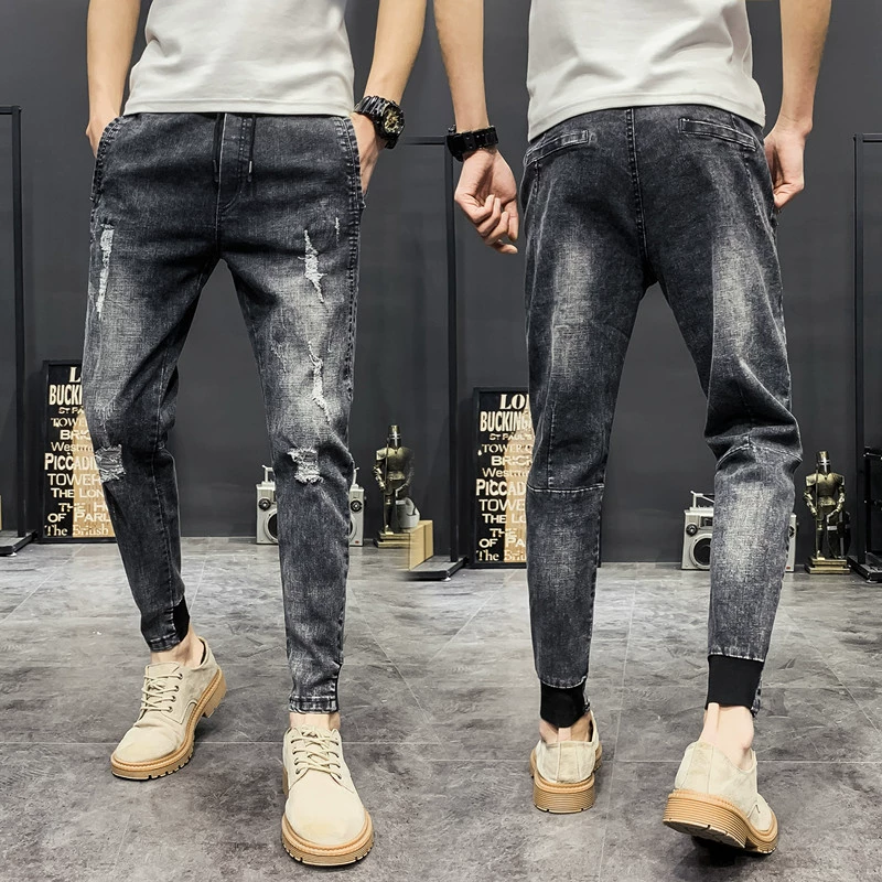 Mùa hè thanh niên quần jeans rách chín điểm quần lửng nam quần lửng nam phong cách Hàn Quốc - Quần jean