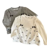 Весенний новый стиль для девочек, рубашка с пасторальным дном, имитация двух предметов, сплошной цвет, универсальный низ с вышивкой бантом, модный кружевной топ