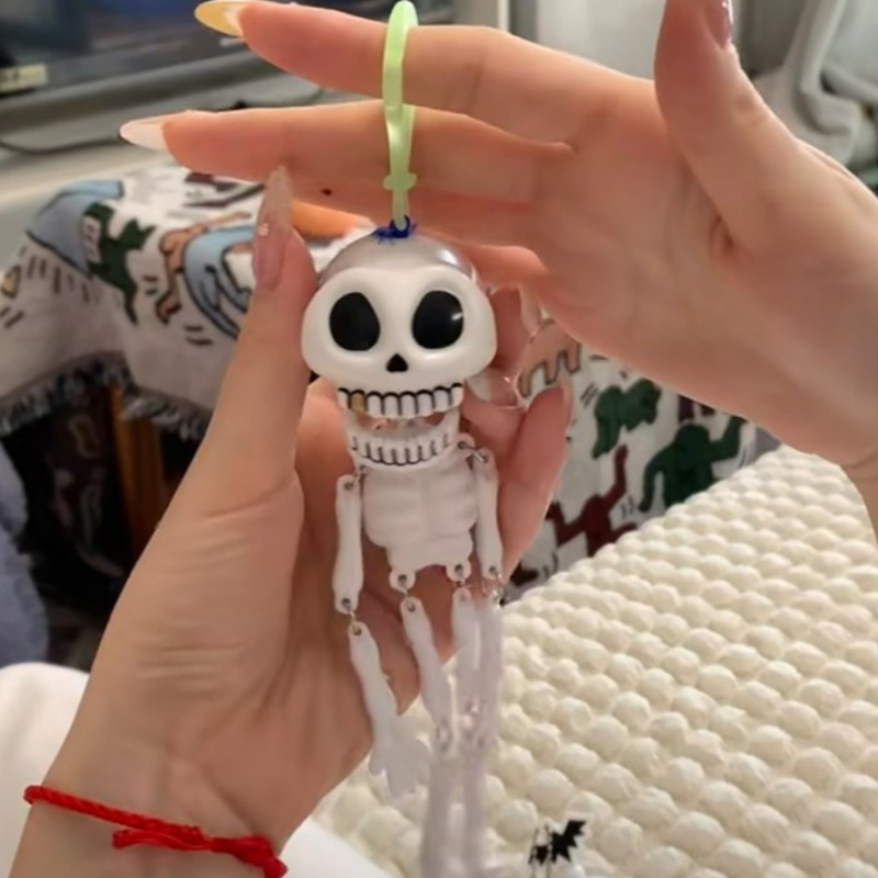 Creative Pull-String Skull Prank Funny Backpack Pendant, Movable Skeleton Stretchable Children's Day Gift