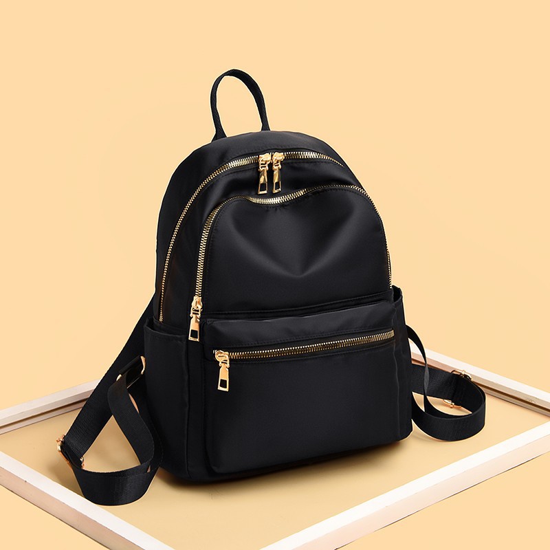 MK&ZAREA~2022 new solid color casual backpack female Korean version of the versatile small backpack Oxford cloth schoolbag