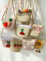 Hong Kong childrens grass woven bag 2021 new girl girl little girl cute skew satchel princess single shoulder bag tide