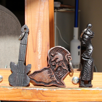 Imported from South Africa African handmade wood carvings portraits maps guitar keychains