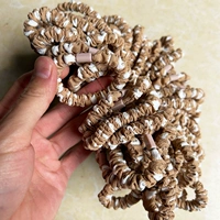 Около 100 колец тонкой верблюжьей кишки в горошек